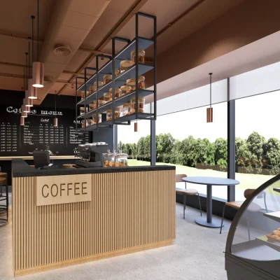 Moderne Kaffeebar in einem Bürogebäude in Berlin mit Sitzbereich und großer Fensterfront.