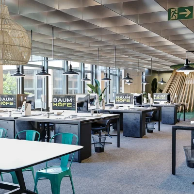 Das Bild zeigt ein modernes Gemeinschaftsbüro mit mehreren Co-Working-Arbeitsplätzen.