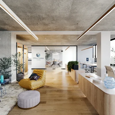 Ein modern eingerichteter Büroraum in Leipzig mit offenen Arbeitsplätzen, Lounge-Ecke und natürlicher Beleuchtung.