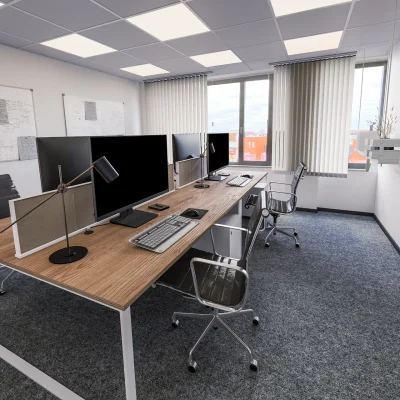 Das Bild zeigt ein modernes Gruppenbüro mit vier voll ausgestatteten Arbeitsplätzen.