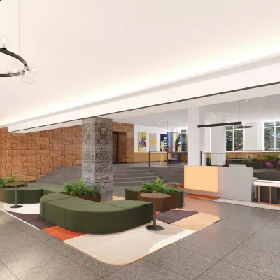 Offene und modern gestaltete Lobby eines Berliner Bürogebäudes mit Kunstwerken und Sitzlandschaft.
